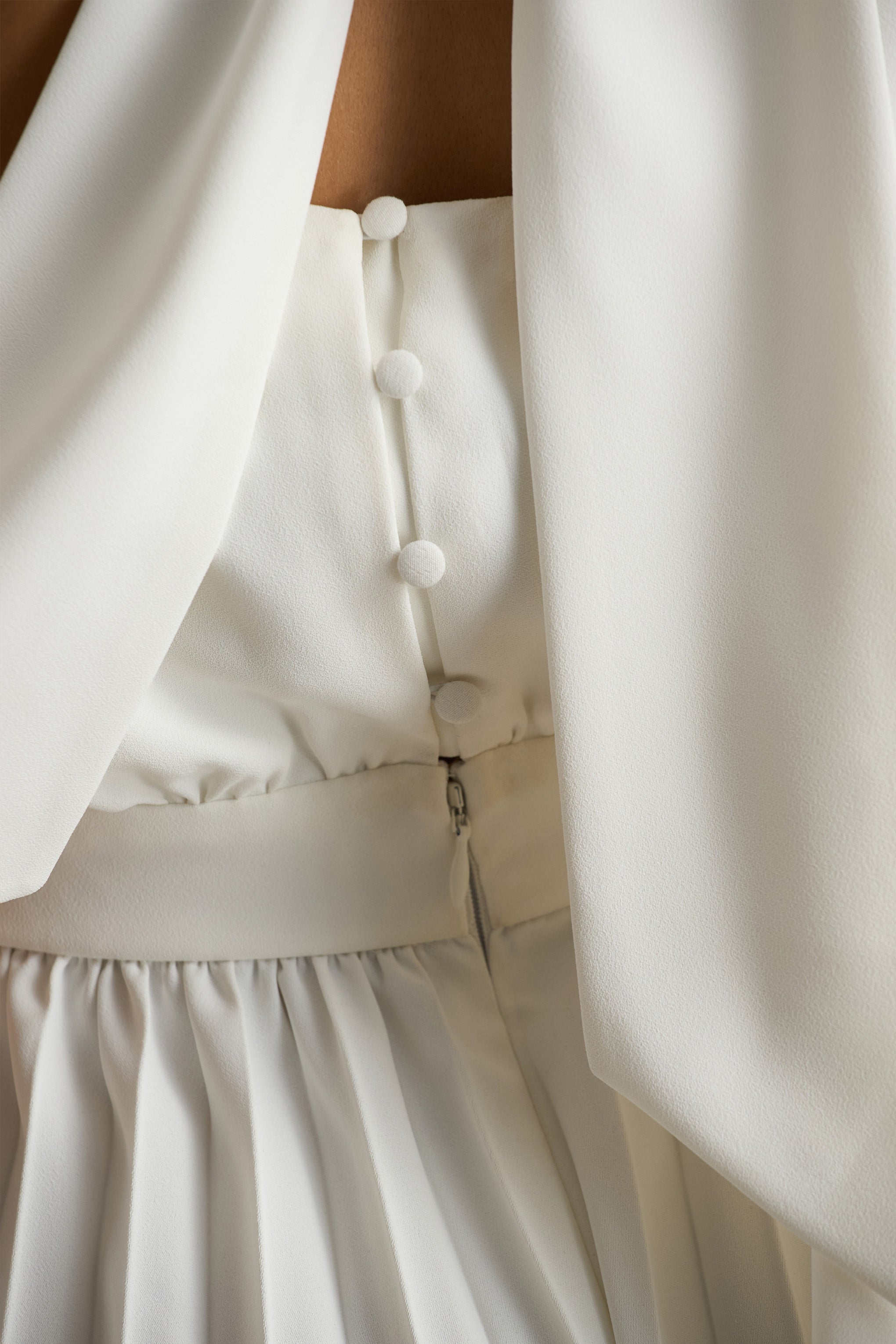 Paradise | Weißer Jumpsuit mit Cape-Ärmeln