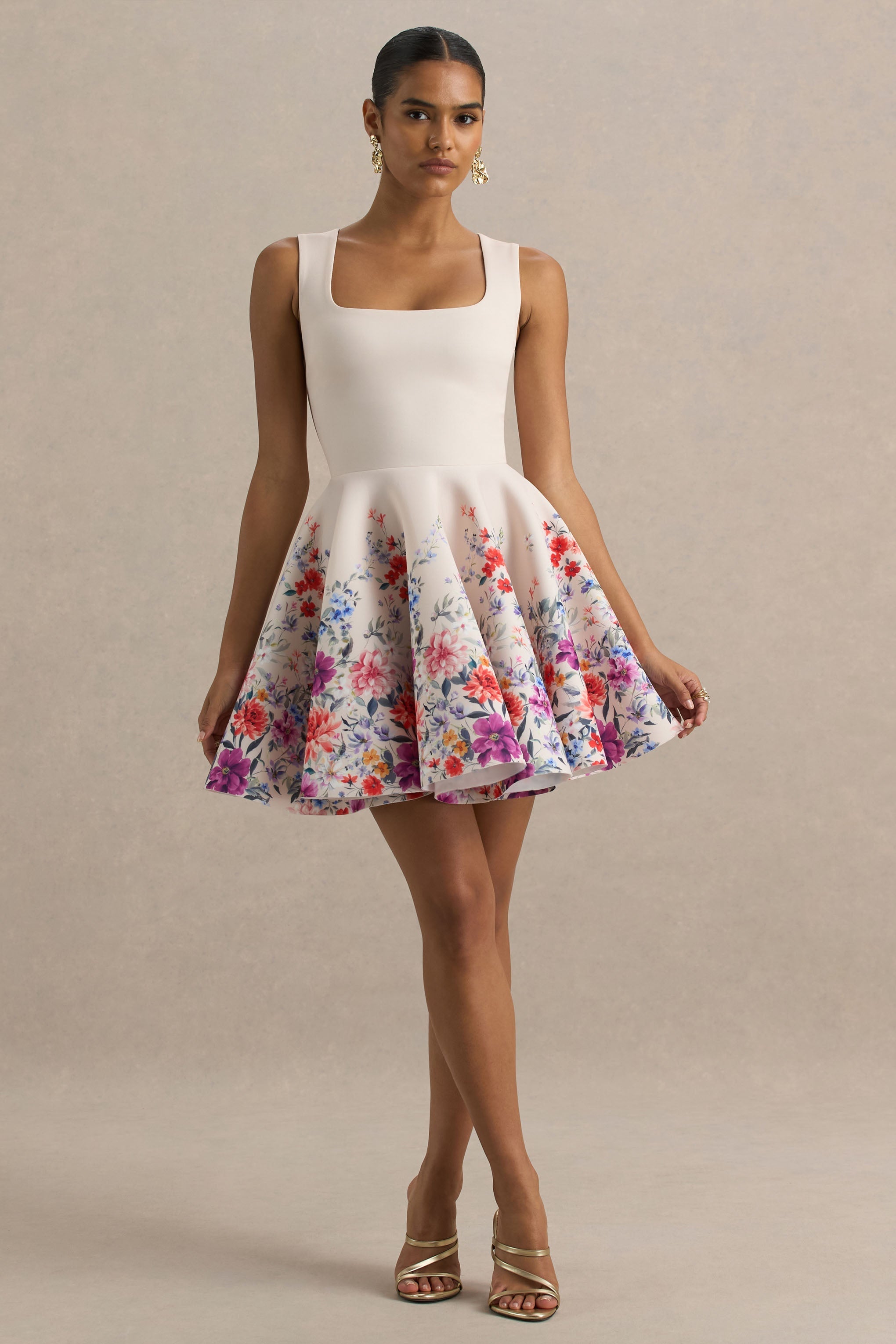 Gemstone | Hellrosa Mini-Skaterkleid mit Blumendruck und quadratischem Ausschnitt.